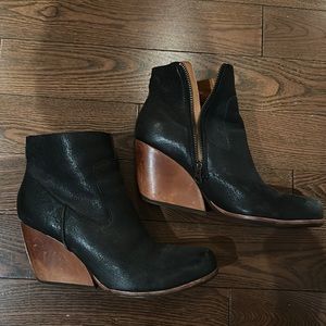 Mule/ cowboy inspired bootie , leather with wedge heel . Used but still great  .